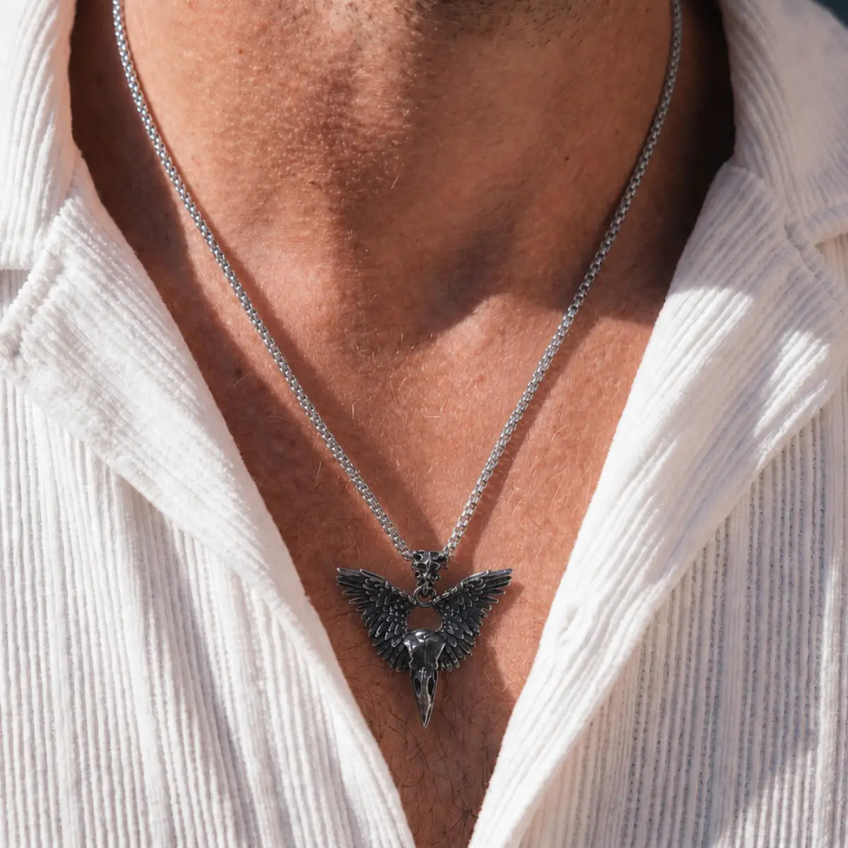 Winged Raven Skull Necklace Antique Silver Worn by Male Model