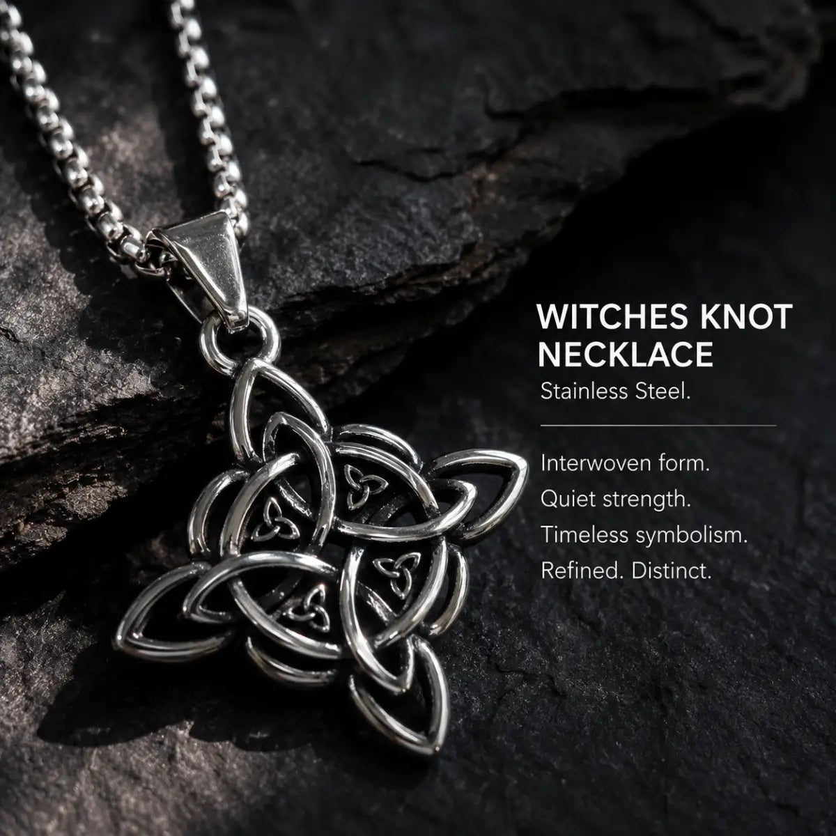 Witches Knot Necklace Silver Displayed on Stone Surface