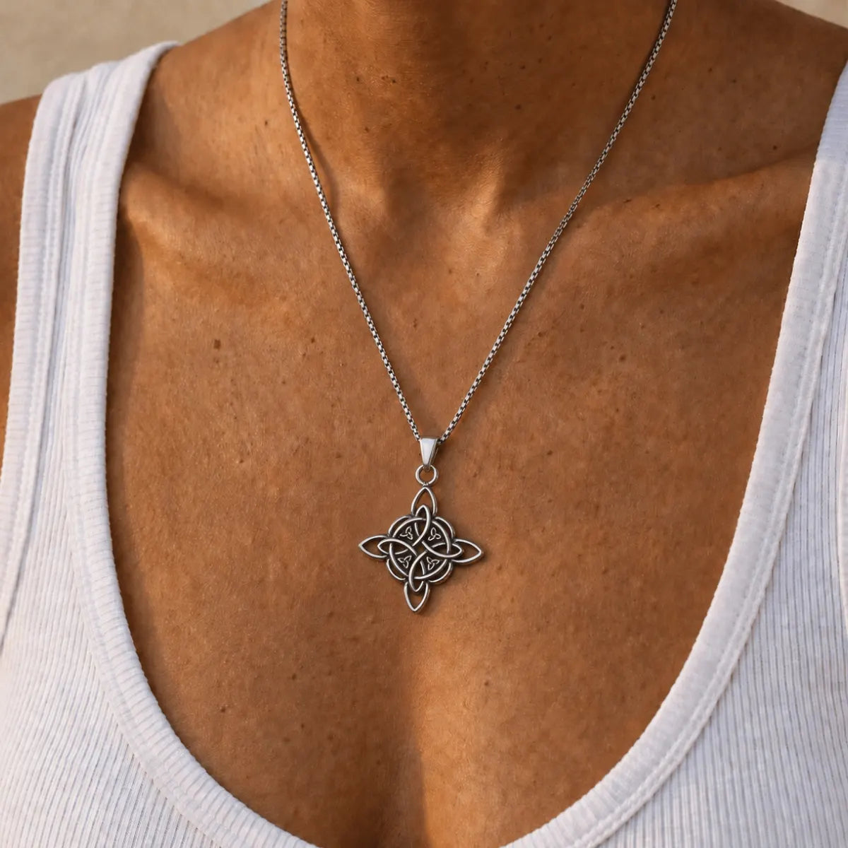 Witches Knot Necklace Silver Worn by Model Chest View