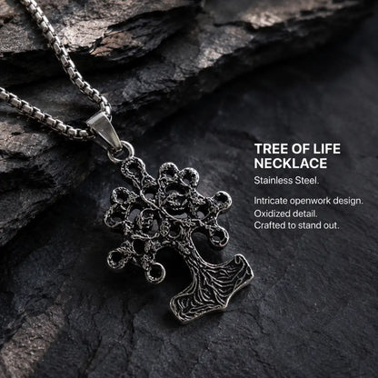 Yggdrasil Thor Hammer Necklace Silver Displayed on Stone Surface