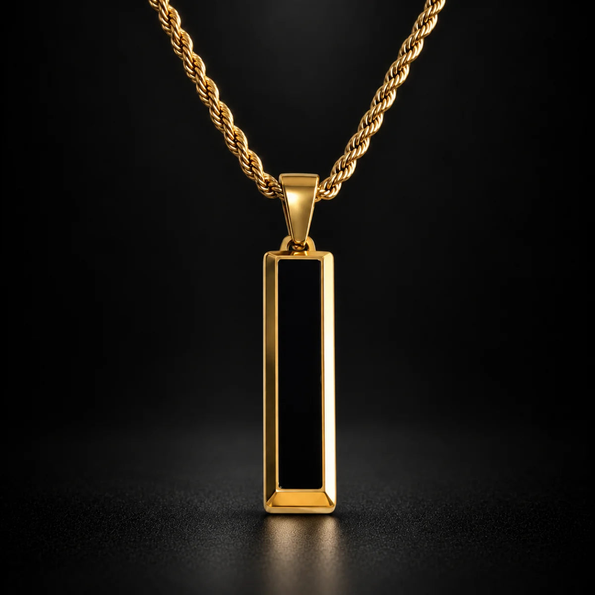black and gold bar necklace black background hero