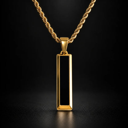 black and gold bar necklace black background hero