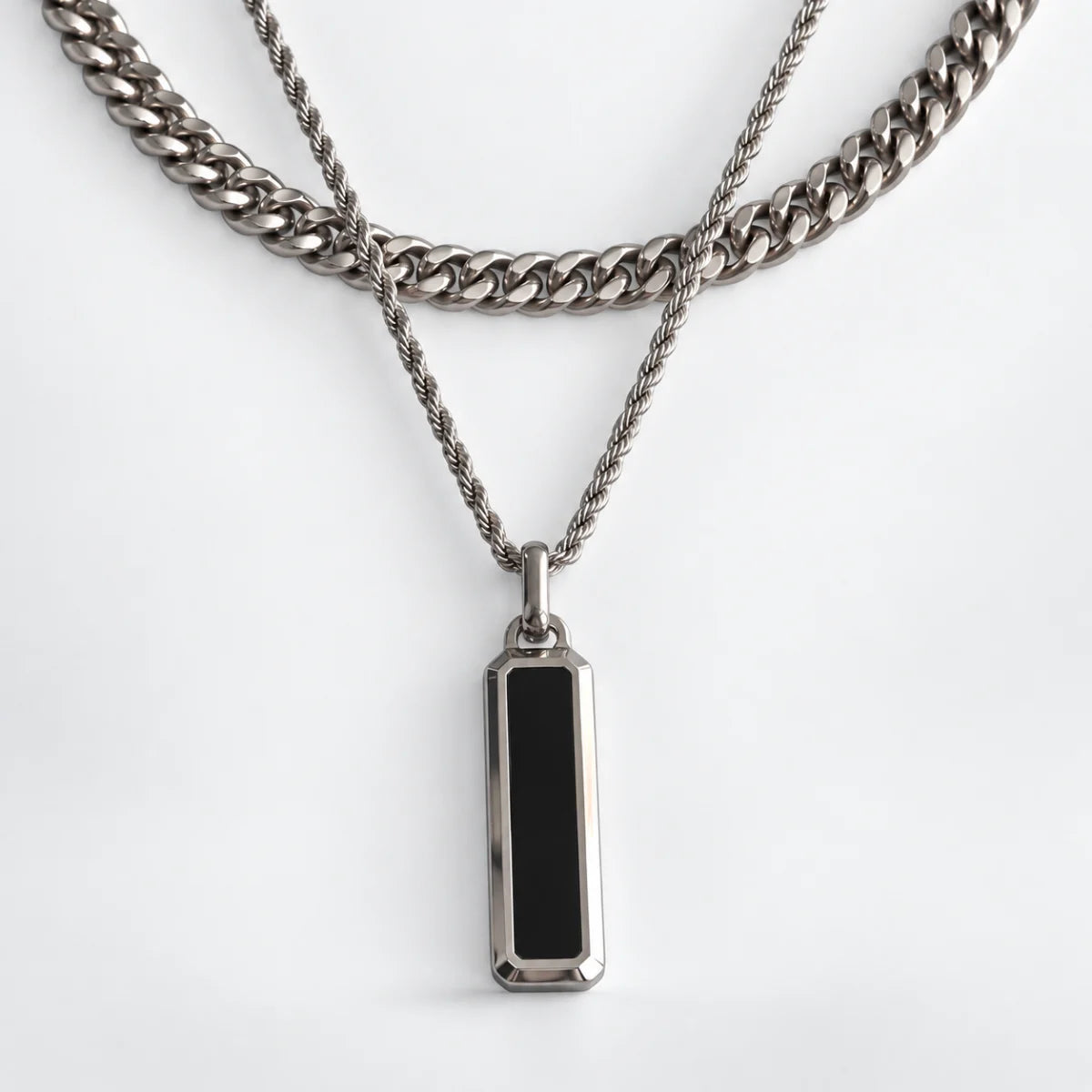 black bar necklace layered set white background
