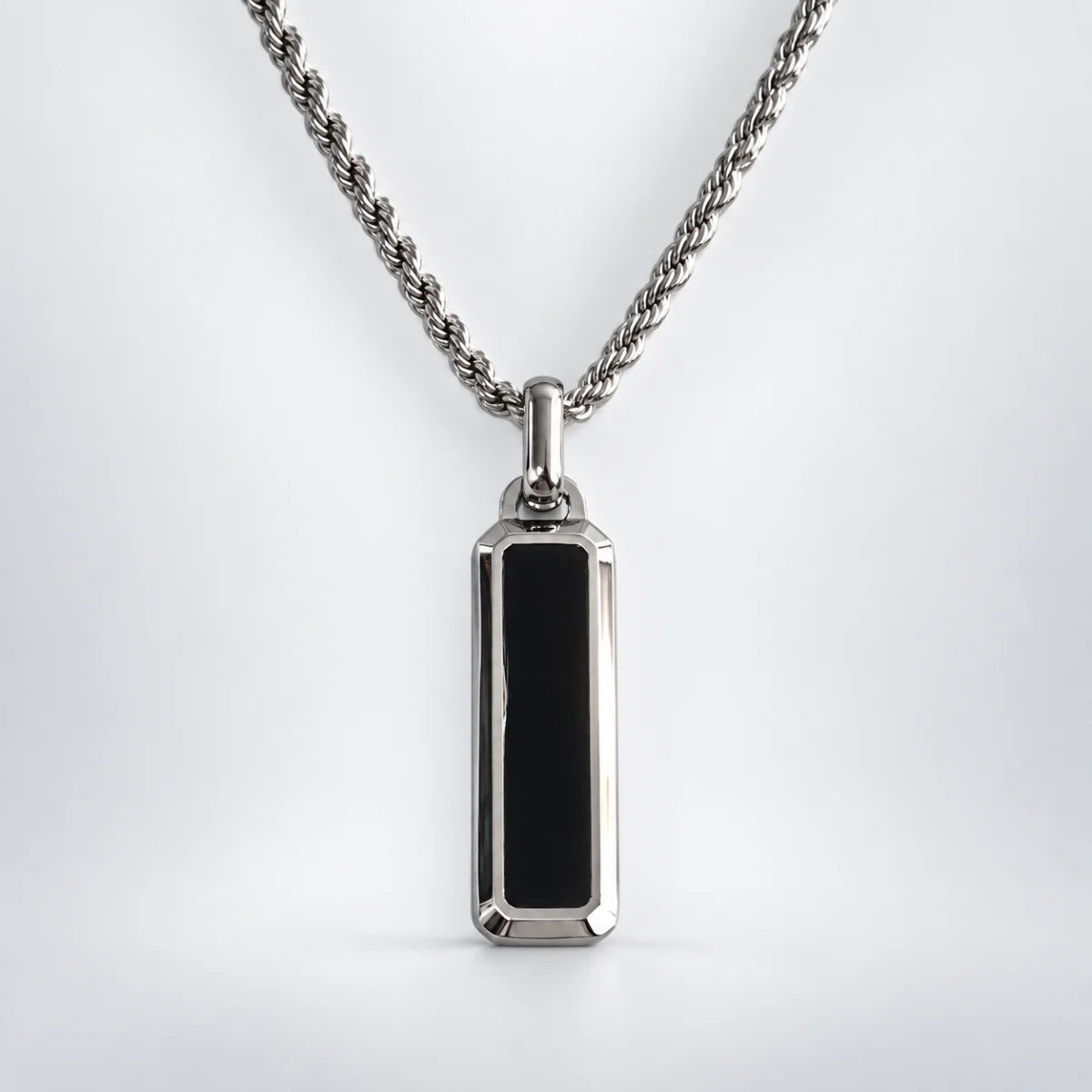 black bar necklace with rope chain white background