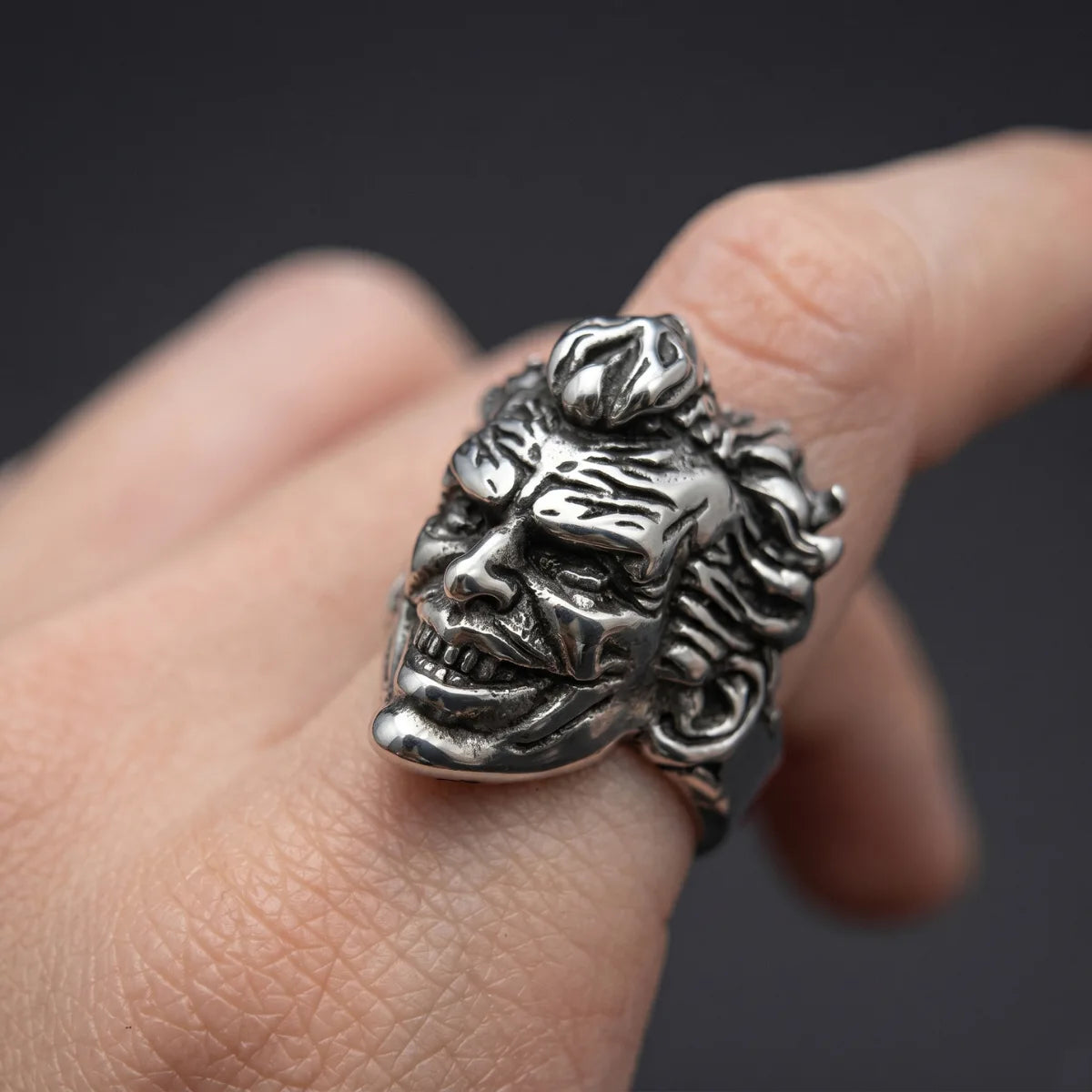 Close Up Hand Wearing Clown Ring Alternative Mens Streetwear Accessories