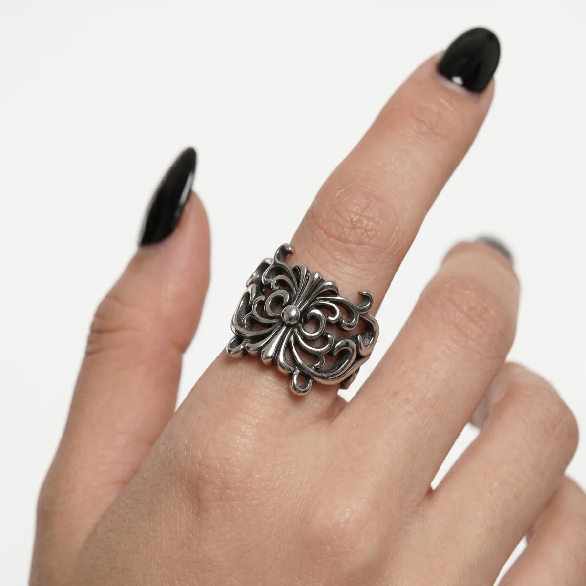 Close Up Hand Wearing Fleur De Lis Cross Ring Witchy Punk Accessories