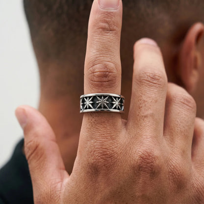 Close Up Hand Wearing Gothic Carved Star Band Dark Aesthetic Mens Jewelry