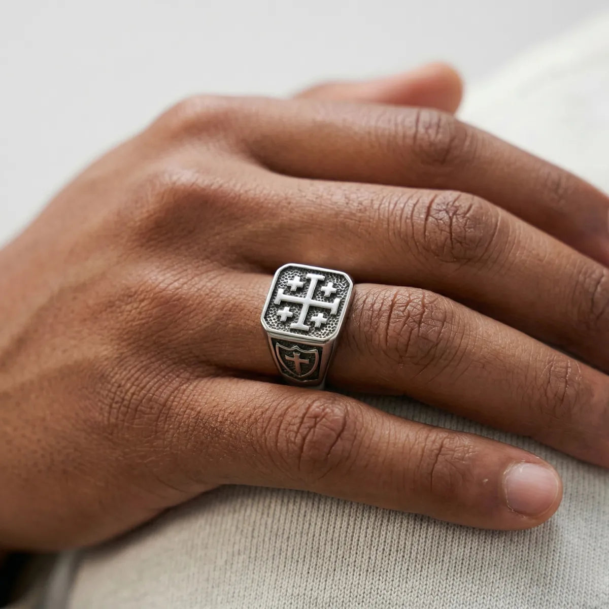 Close Up Hand Wearing Jerusalem Cross Ring Catholic Jewelry