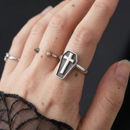 Close Up Hand Wearing Minimalist Cross Coffin Ring Witchy Punk Accessories