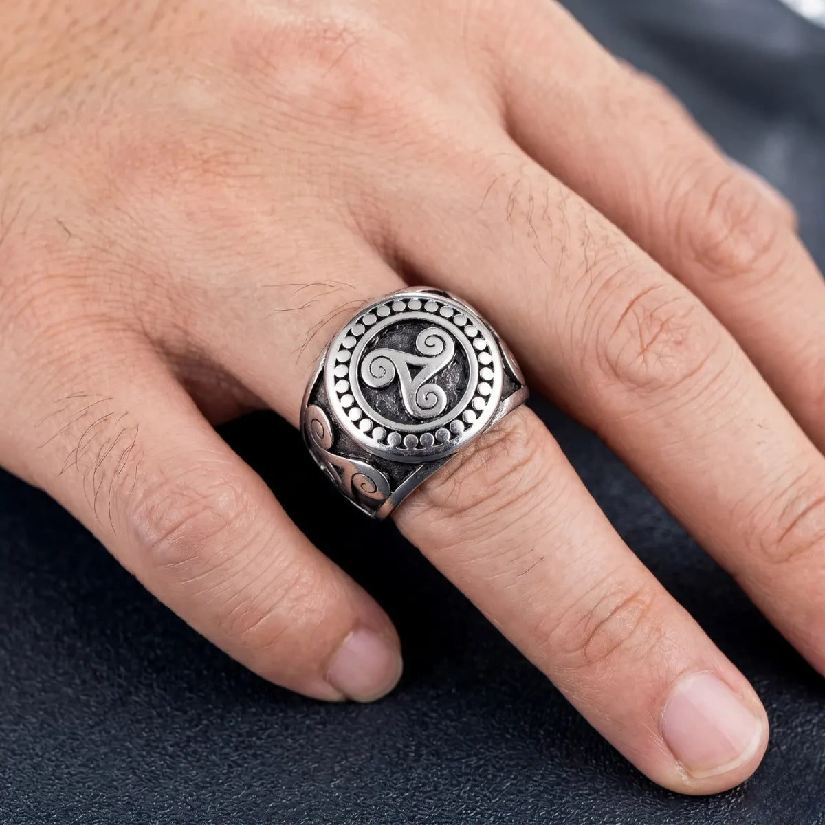 Close Up Hand Wearing Triskele Ring Ancient Symbol Mens Jewelry