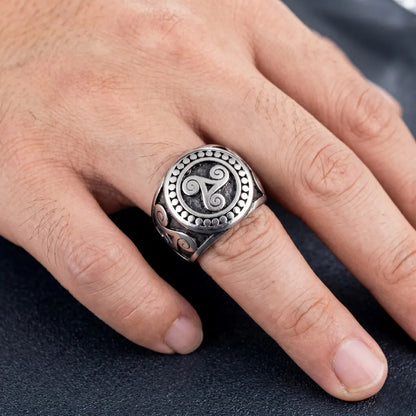 Close Up Hand Wearing Triskele Ring Ancient Symbol Mens Jewelry