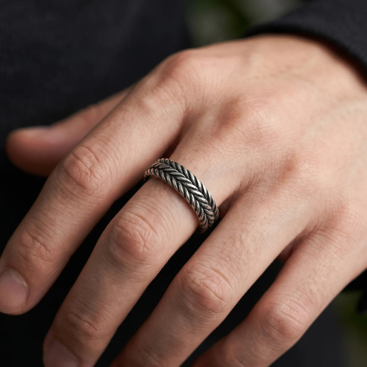 Close Up Hand Wearing Viking Braided Band Ring Silver Mens Norse Jewelry