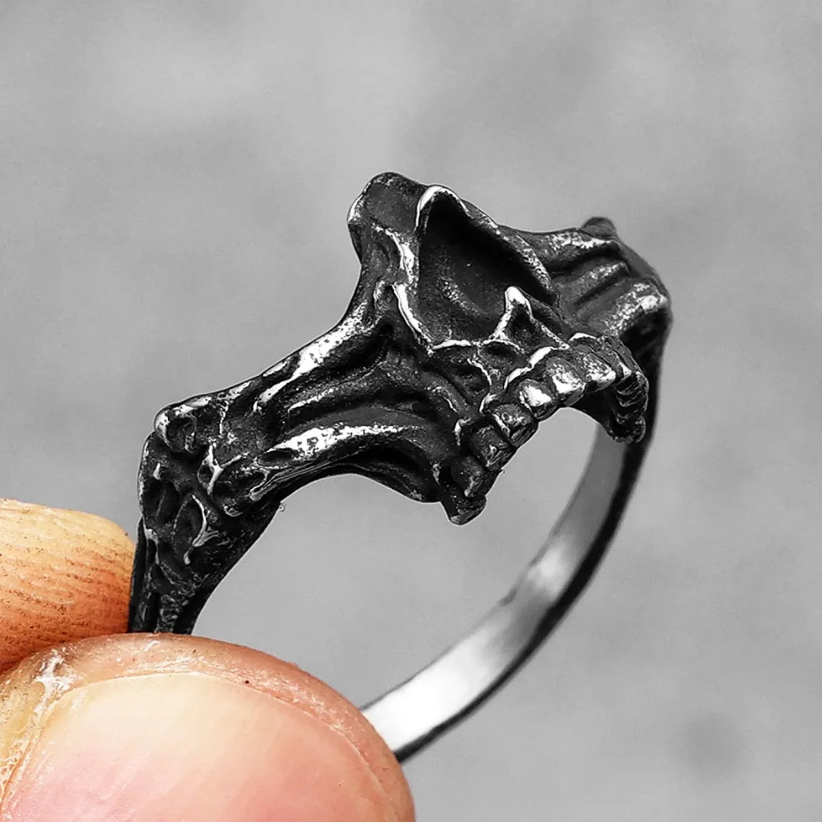 Close up holding silver Half Jaw Skeleton Ring