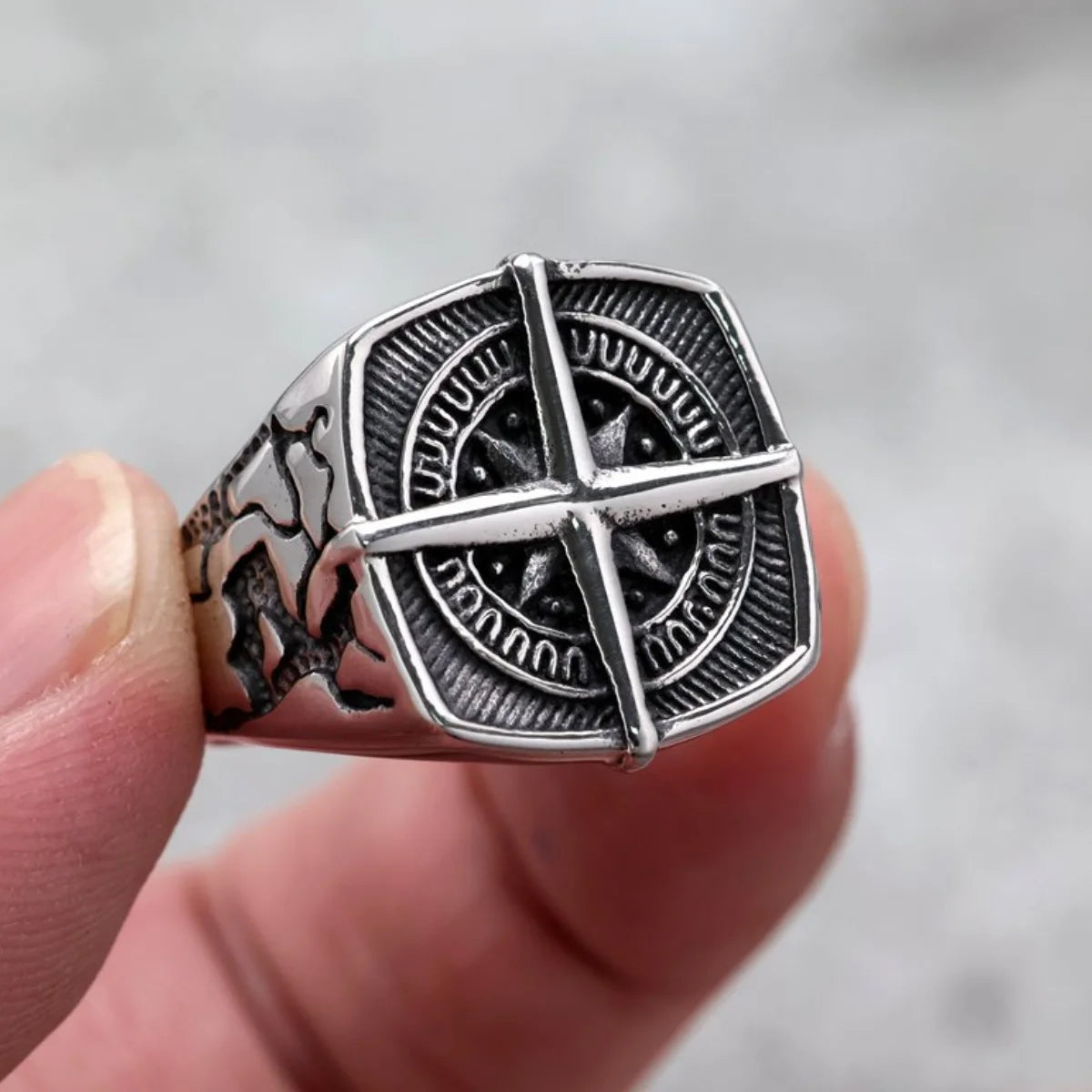 Close Up Holding Square Compass Ring World Map Detail Vintage Compass Jewelry