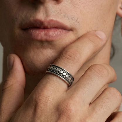 Close Up Man Wearing Celtic Braided Ring Industrial Woven Design Mens Wedding Band