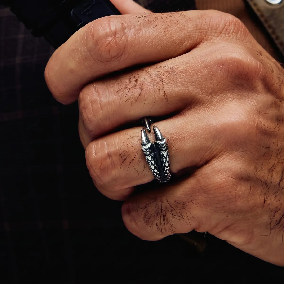 Close Up Man Wearing Split Shank Silver Dragon Claw Ring