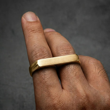 Close up of men‘s gold Two Finger Ring on hand