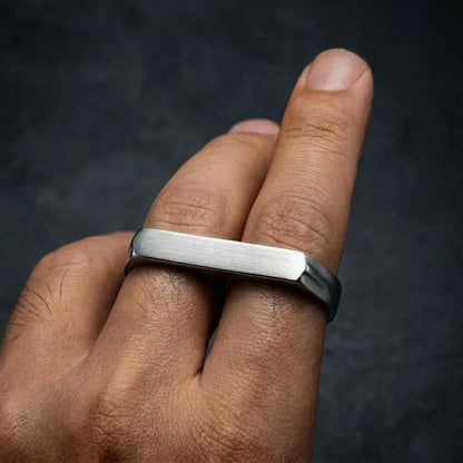 Close up of men’s silver Two Finger Ring on hand