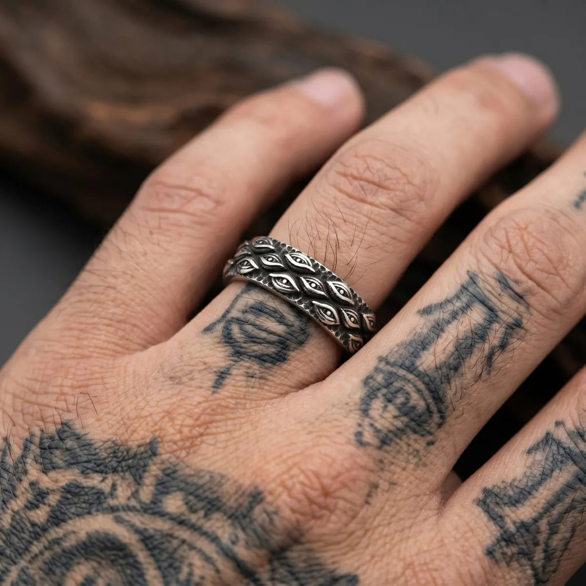 Close Up Tattooed Hand Wearing All Seeing Eye Band Ring Dark Aesthetic Mens Jewelry