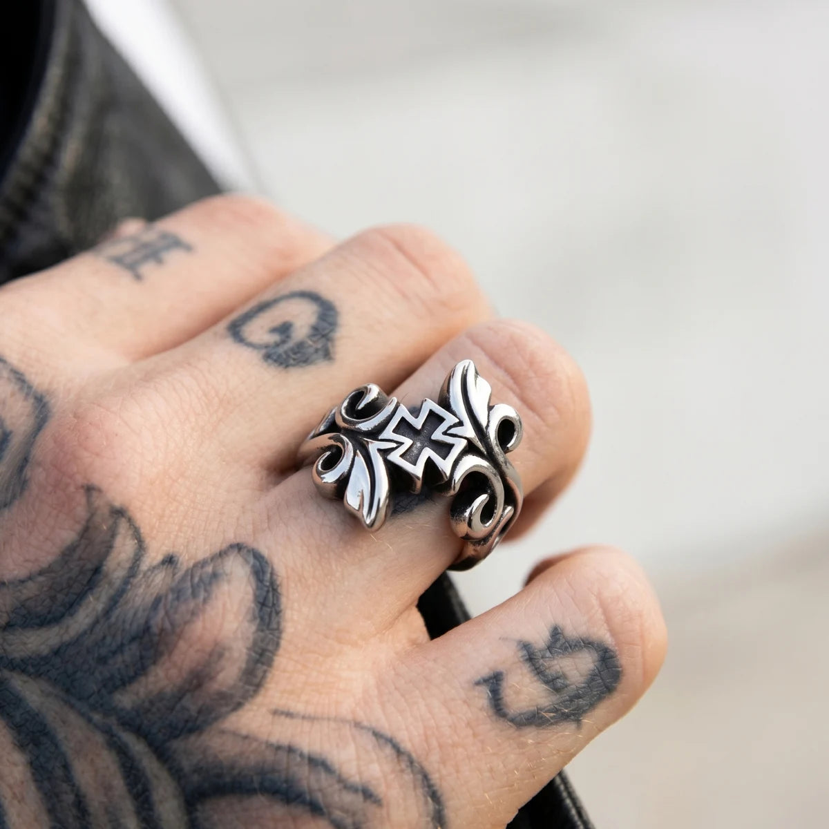 Close Up Tattooed Hand Wearing Bypass Cross Ring Mens Christian Goth Jewelry