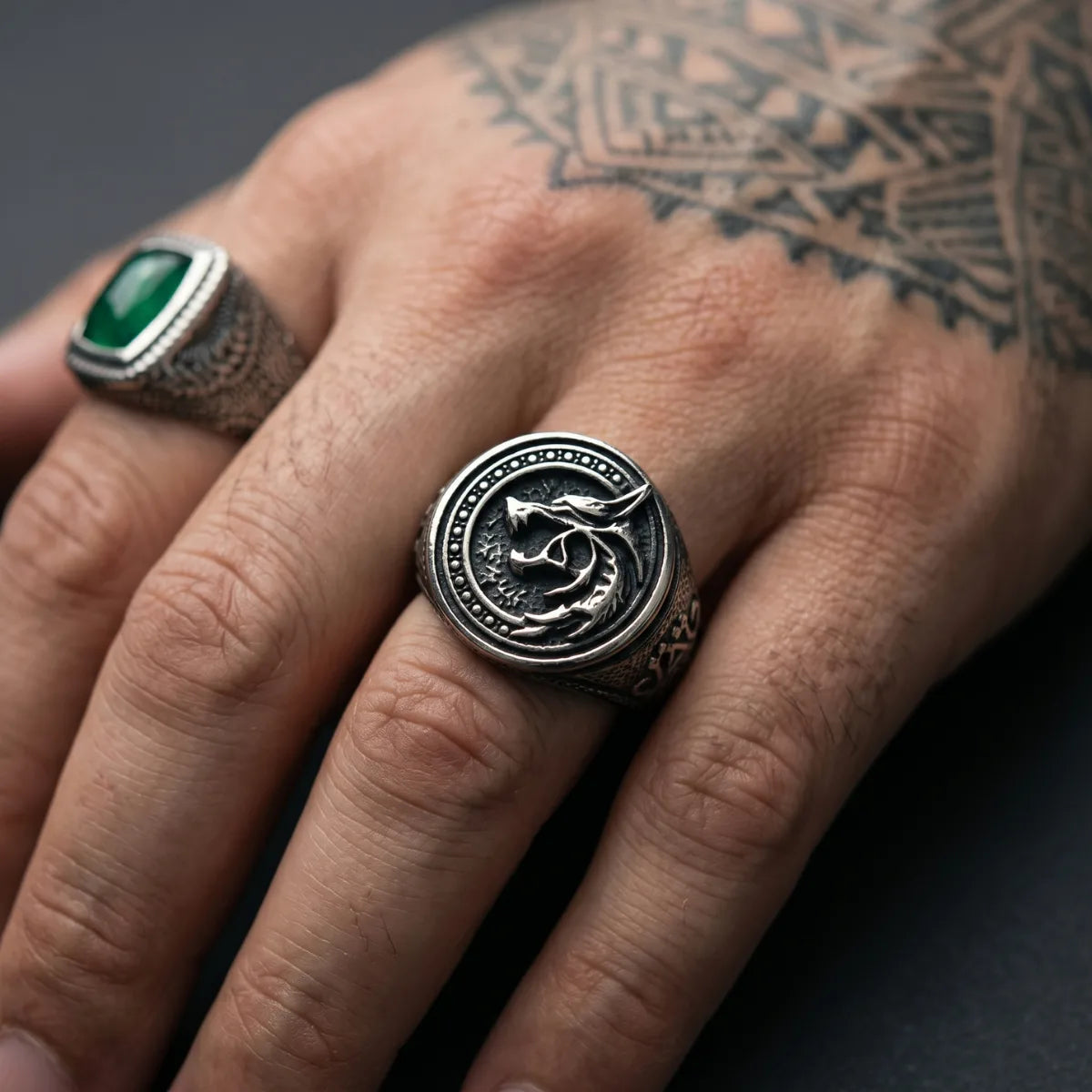 Close Up Tattooed Hand Wearing Tribal Wolf Signet Ring Silver Dark Aesthetic Mens Fantasy Jewelry