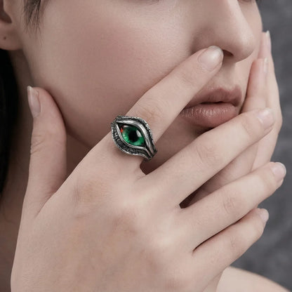 Close up of woman wearing silver Green Eye Ring