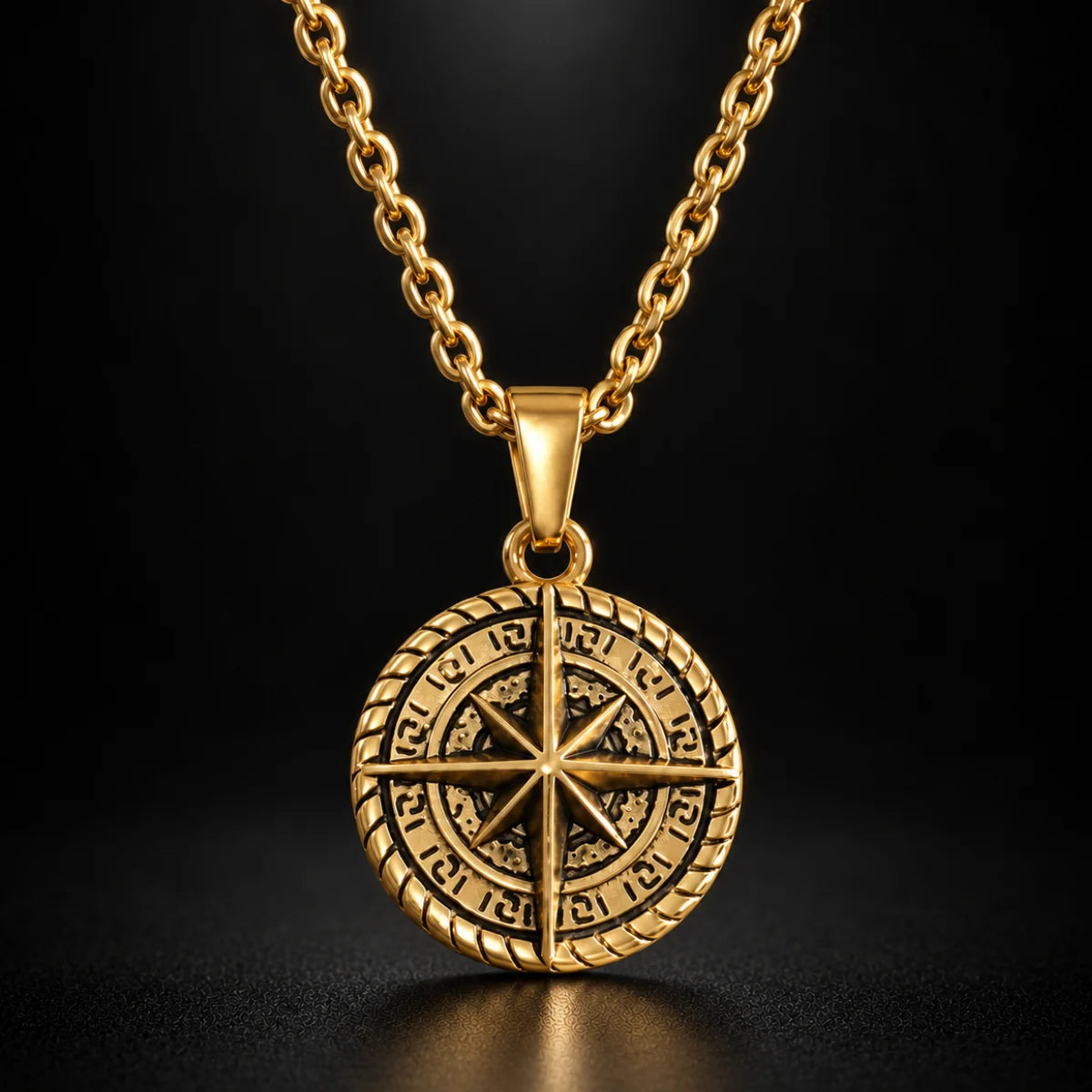 compass coin necklace gold black background hero
