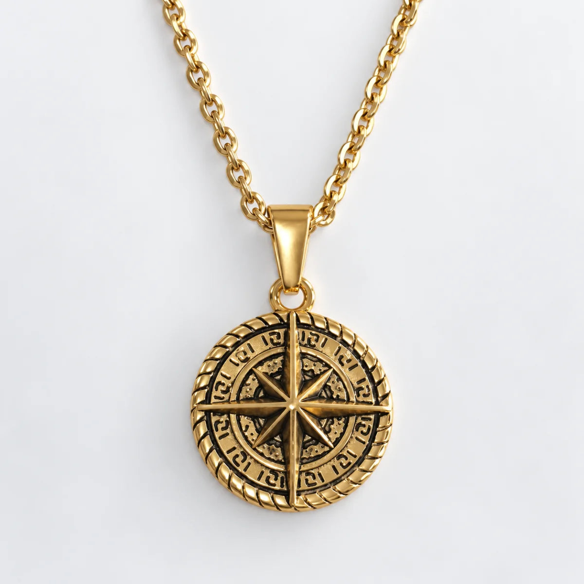 compass coin necklace gold with o chain white background