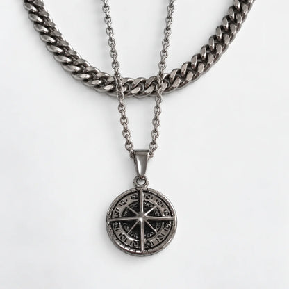 compass coin necklace silver layered set white background