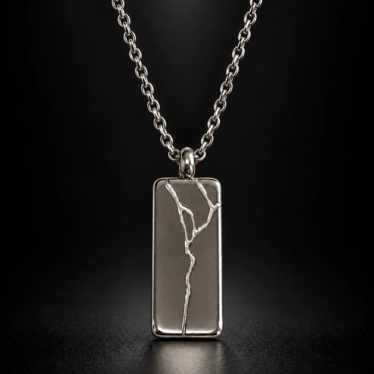 cracked bar necklace silver black background hero