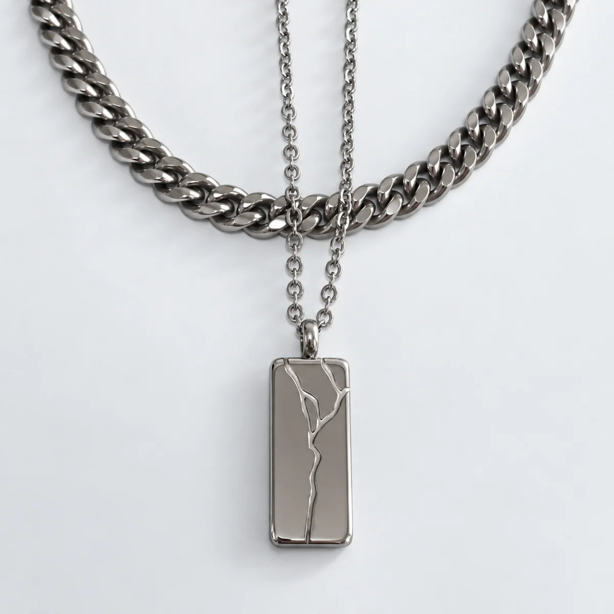 cracked bar necklace silver layered set white background