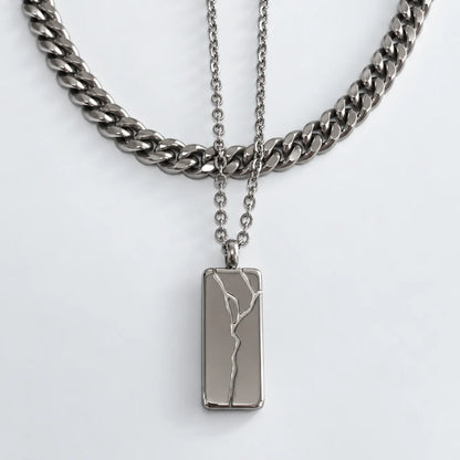 cracked bar necklace silver layered set white background