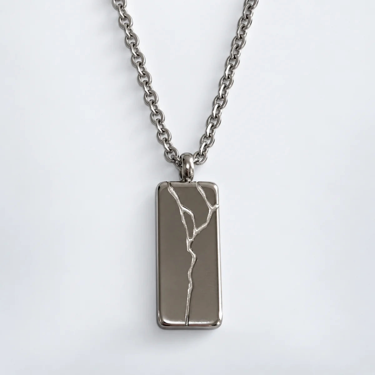 cracked bar necklace silver with o chain white background