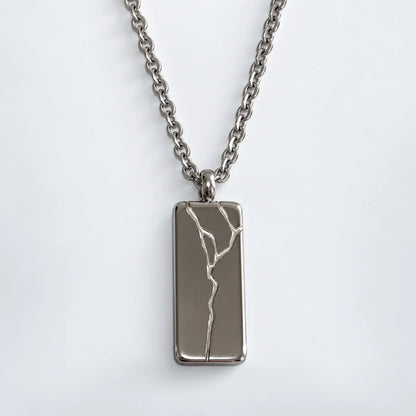 cracked bar necklace silver with o chain white background