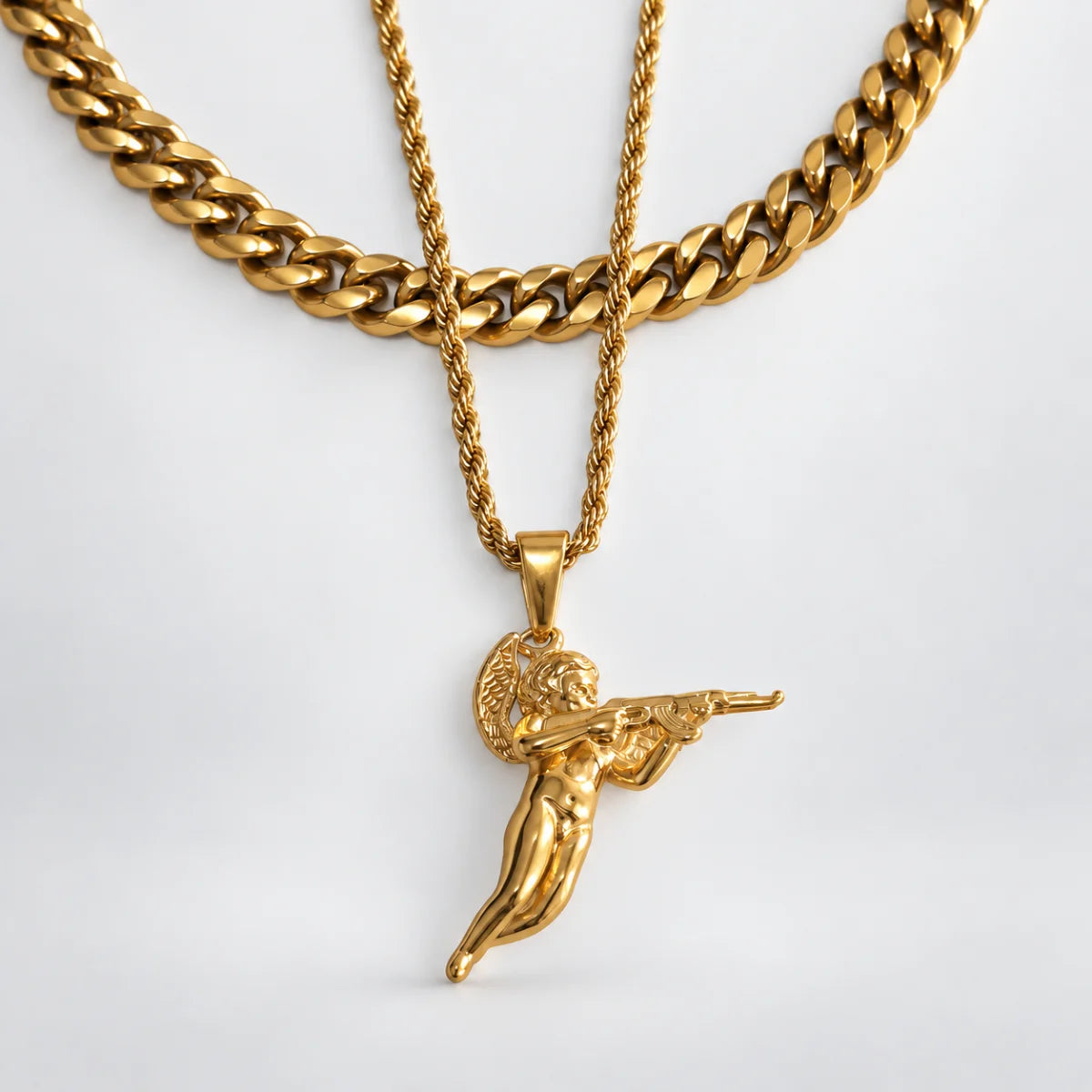 cupid pendant necklace gold layered set white background