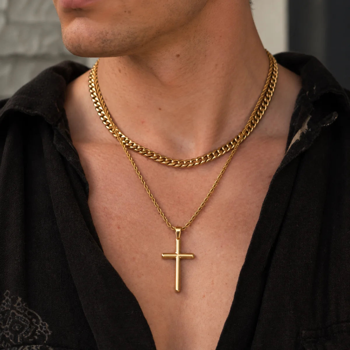 gold minimalist cross necklace layered set lifestyle