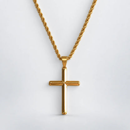 gold minimalist cross necklace with rope chain white background