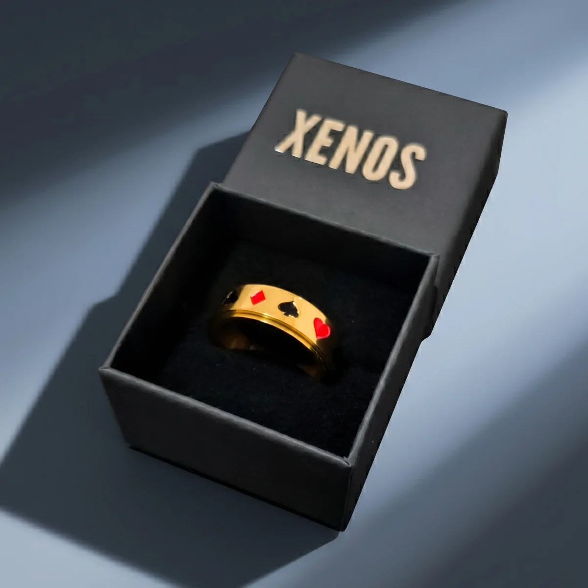 Gold Playing Card Spinner Ring Inside a Xenos Jewelry Box