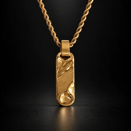 gold textured bar necklace black background hero