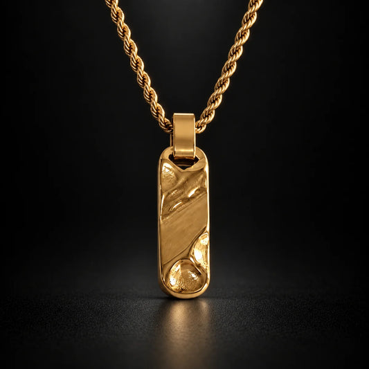 gold textured bar necklace black background hero