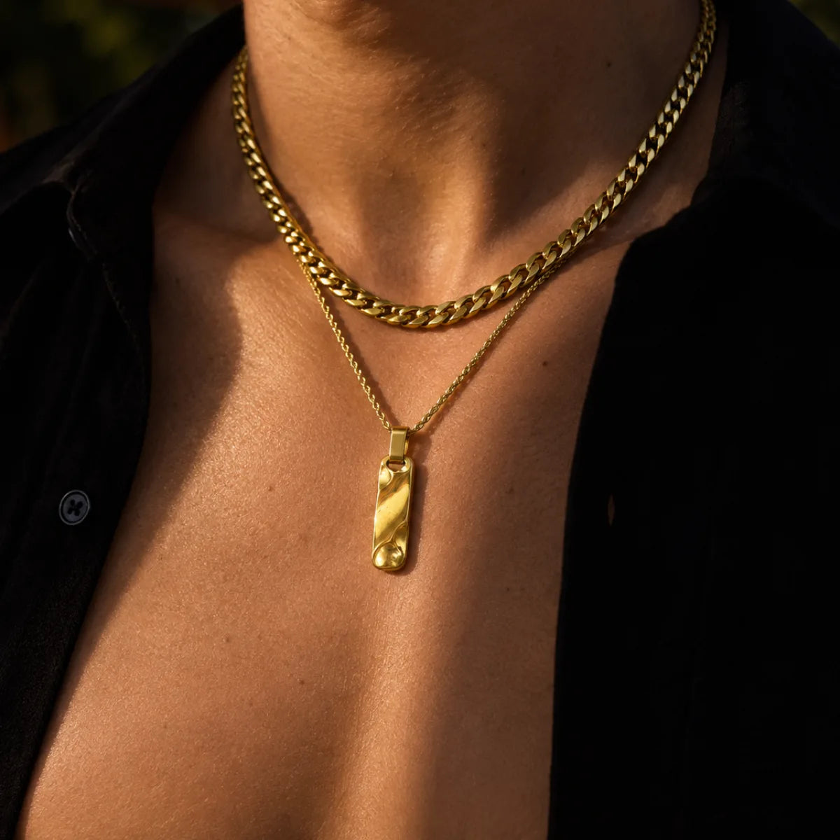 gold textured bar necklace layered set lifestyle black shirt