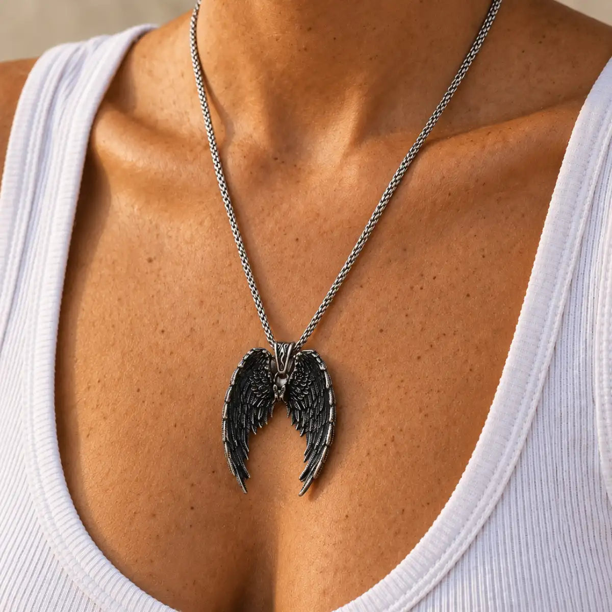 gothic angel wings necklace lifestyle white tank top