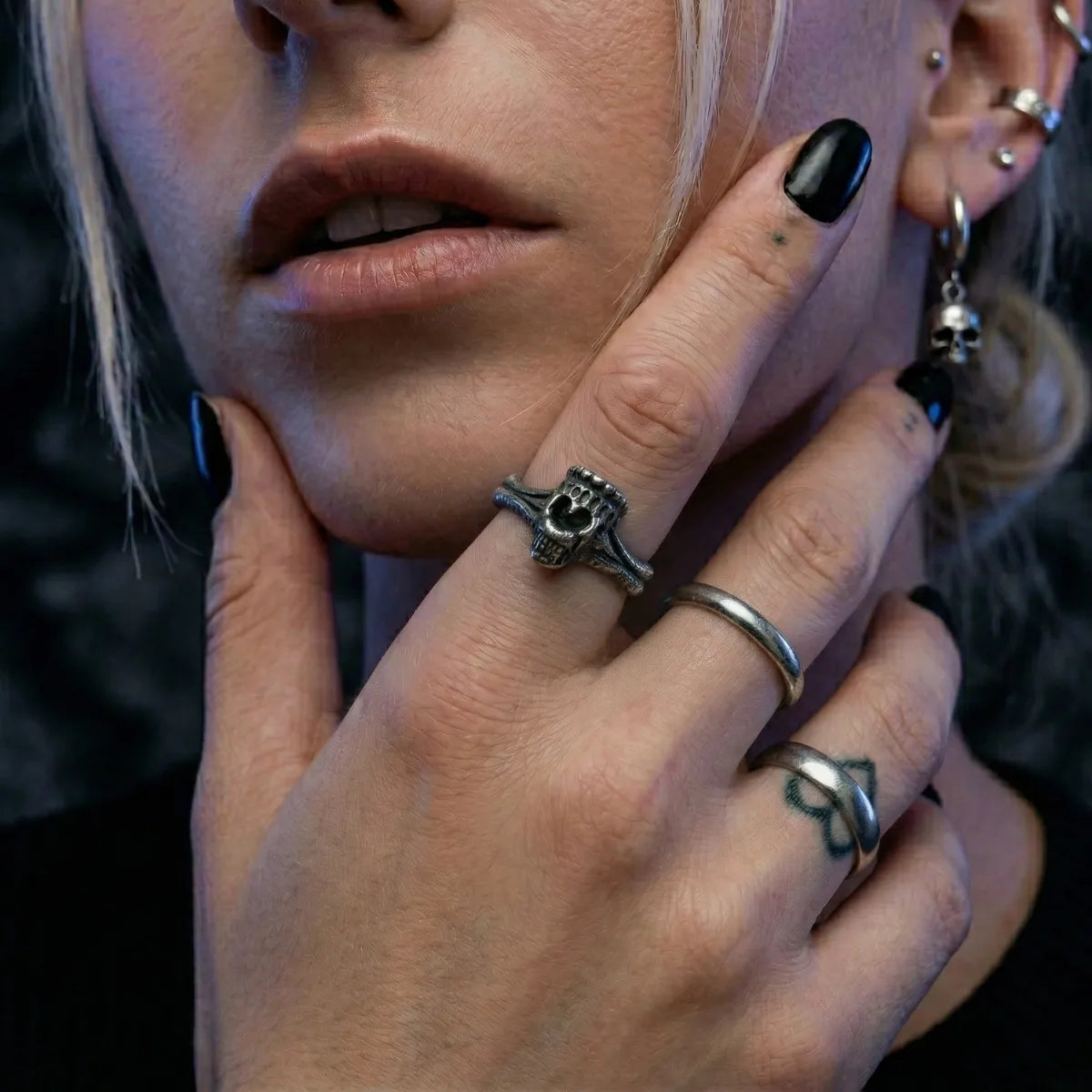 Half Skull Ring worn on hand featuring a subtle tattoo