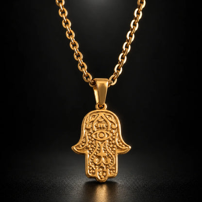hamsa pendant necklace gold black background hero