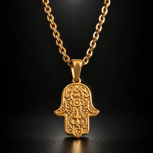 hamsa pendant necklace gold black background hero