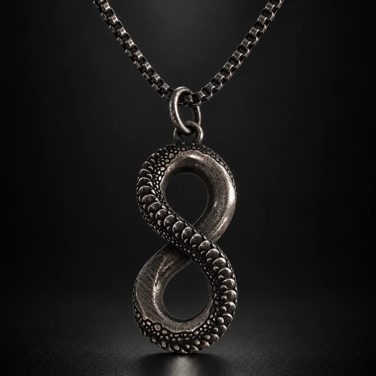 infinity snake necklace black background hero