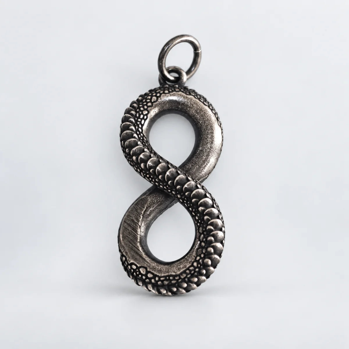 infinity snake necklace pendant only white background