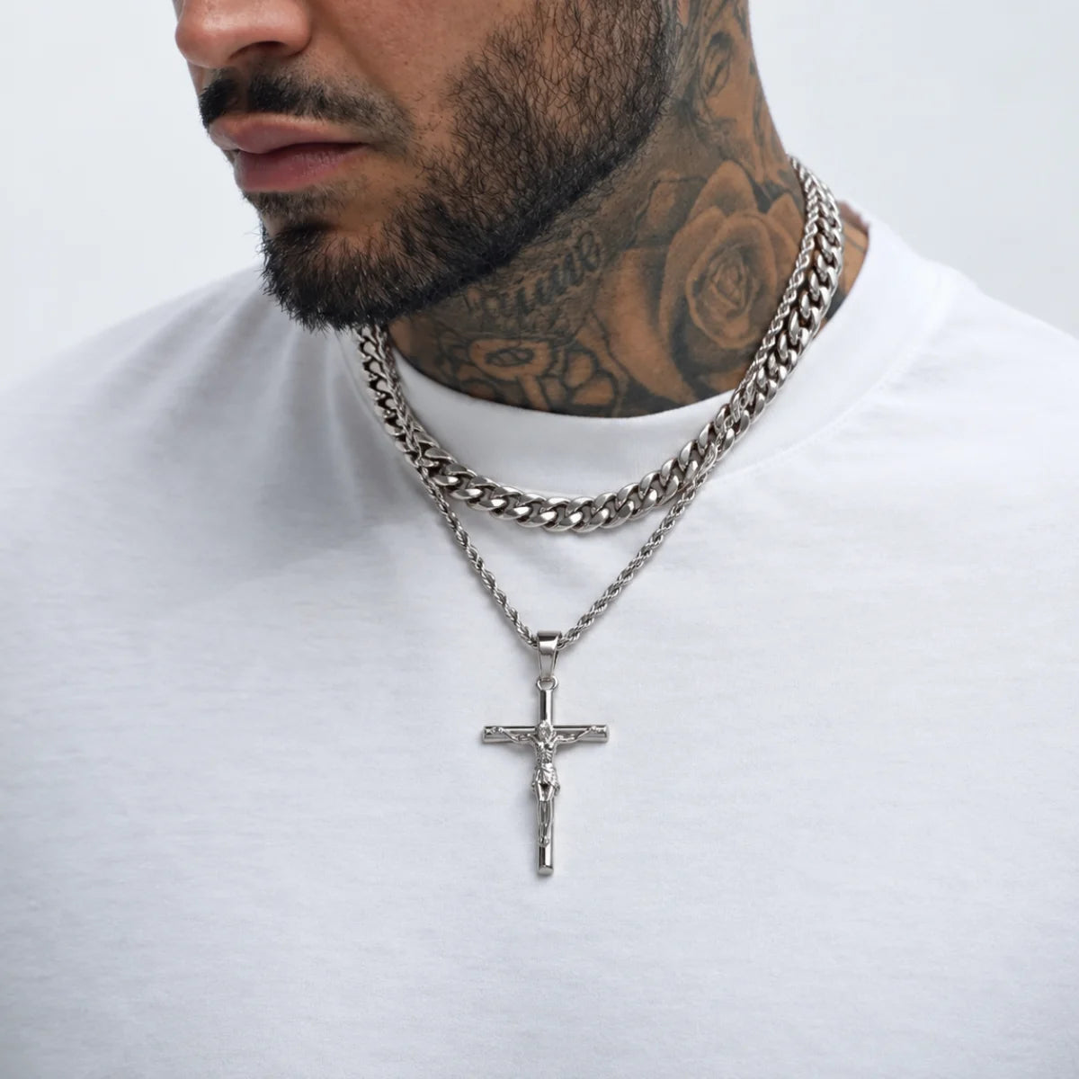 jesus crucifix rope chain silver layered set lifestyle white shirt