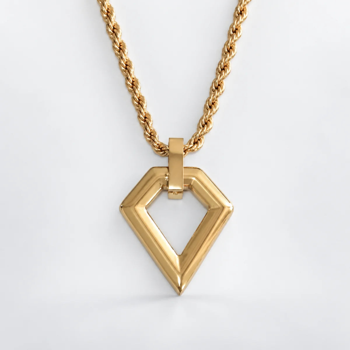 kite shape pendant necklace with rope chain white background