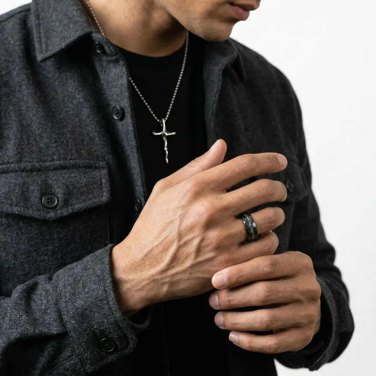 Lifestyle shot of man wearing 8mm Guitar String Tungsten Ring mens jewelry